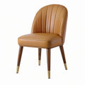 Chaise rembourrée rétro en similicuir camel avec pieds en bois brun et métal doré, 52 × 58 × 82 cm
